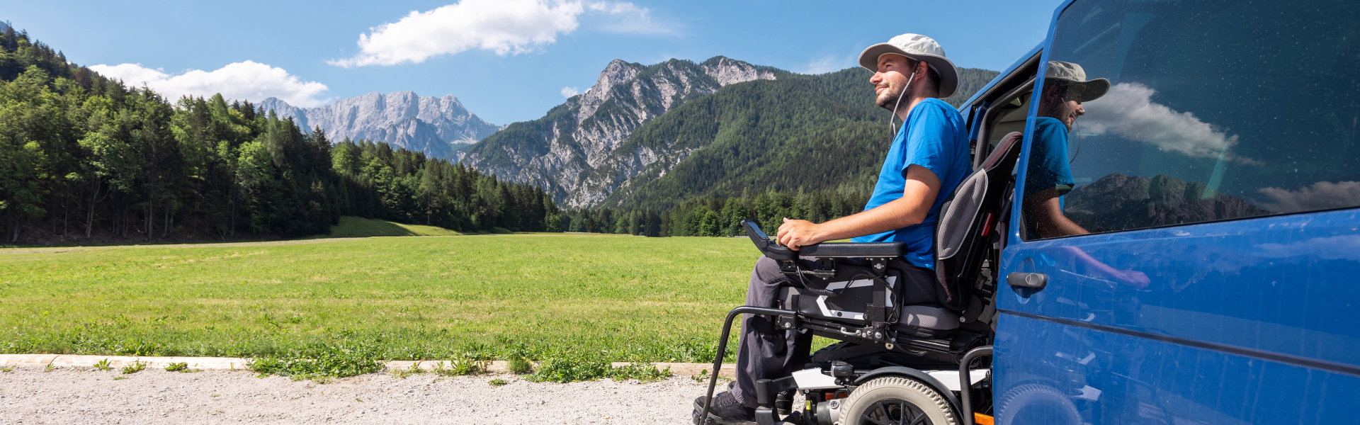 man in wheelchair enjoy the view of the mountain